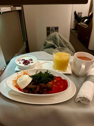 BA2231 LGW-BKK 2nd meal breakfast: comically rubberised “poached” egg, mushrooms, beans, spinach. Served with plain soy yoghurt that tasted frankly disgusting.