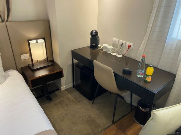 small desk and fridge