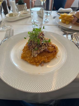 Schnitzel. The toppings went well with the chicken. 