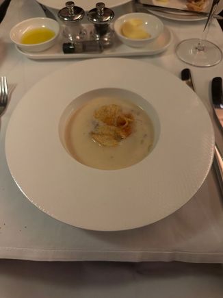 Jerusalem artichoke soup. Exact same as what is being served in AA F, however the presentation is light years better. 