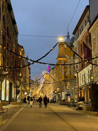 illuminated street in the downtown area