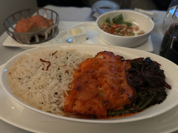Curried fish that was slightly undercooked and so flaky and moist, in J.