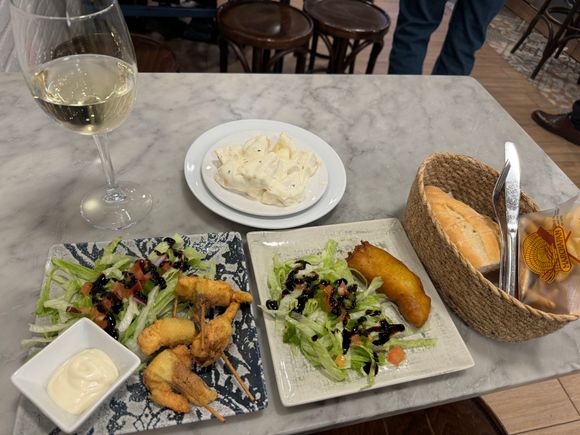this entire tapas dinner (incl wine) was €13.10 

L- langoustines w zucchini; top- potato salad w garlicky aioli; R- bacalao (salt cod)