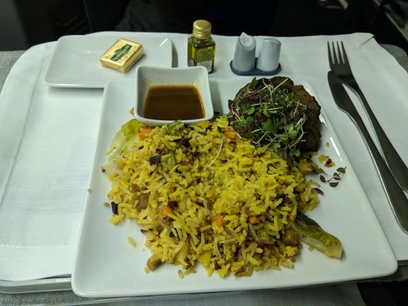 Well here's the steak. The rice tasted like leftover from 2 days ago and the steak is probably 120% cooked. It was so hard that took me some effort to cut. What a disappointment.