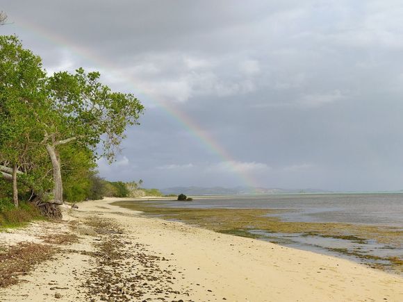  Poé beach, under light, refreshing rain...