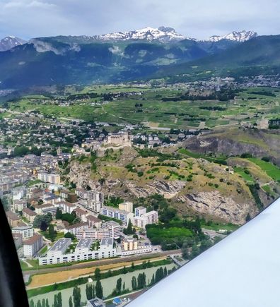 A clear view of the city of Sion before landing back at the airport there 