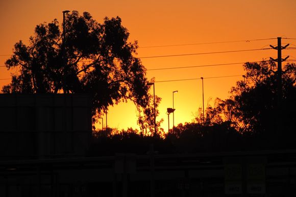 Yesterday's sunset was at the Chapman Peak Drive; today's at a rental car lot :-)