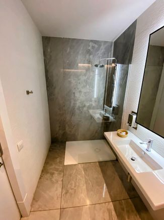 Nothing fancy, but clean and has everything you'll need. Main thing it was available, last time I tried to have a shower, I couldn't get one. My poor seat neighbors.