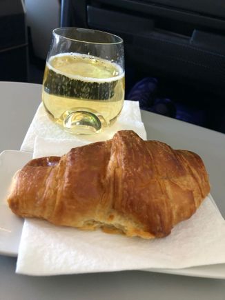 Buttery Croissant and a glass of Spanish bubbly to start the meal