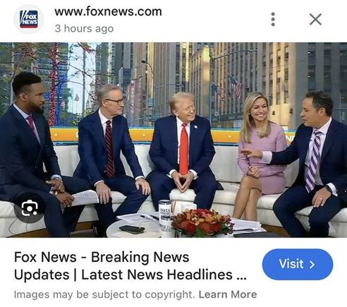 Why would Trump appear to be sitting on a black pad on Fox and Friends WHITE couch?  :eek: