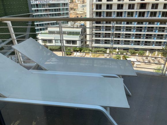 Balcony with deckchairs