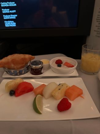 I wasn't planning have breakfast before landing in Singapore, but as I was awake I thought I'd try a bit. The fruit was really nice & ripe and the croissant wasn't too bad either (for a plane croissant).