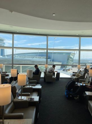 After the club's reception, you'll see the big room with nice windows letting in light and chairs in rows or next to the window, there is a seperate style seating area close to the bar on the left ...... 