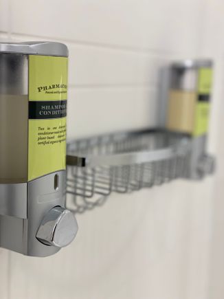 Shower amenities in dispensers
