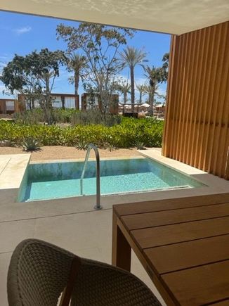 view, behind cabanas of family pool area