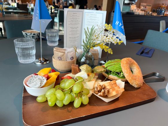 “Family” breakfast platter in the roped off Globalist area (note the World of Hyatt flags on the table) 
