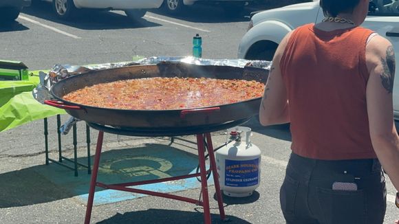 Impatiently waiting for the paella to cook.  One of my favorite restaurants serves free paella to celebrate its anniversary 