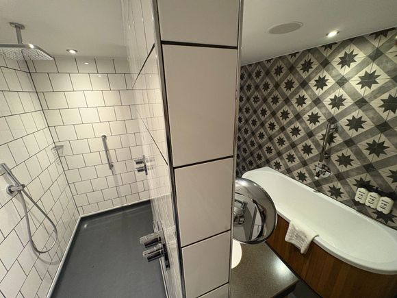 And it is open on the other end too, so one can walk circles in the bathroom 