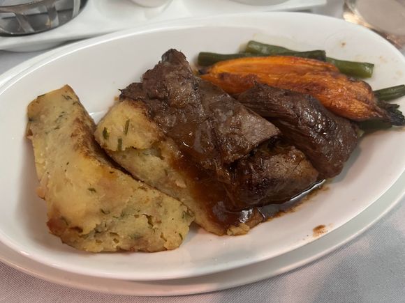 Braised short rib. Appropriately pull apart. I thought the pommes had a strange sweet note. 