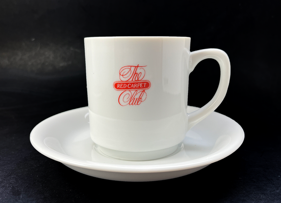This cup and saucer set was just beginning be phased out of the RCC when I bought my first membership in 1999. The script + times roman-esque serif fonts combination was used to convey elegance and sophistication through the 1980s and 1990s, but it was starting to look dated and tired by the time of the dotcom bubble.