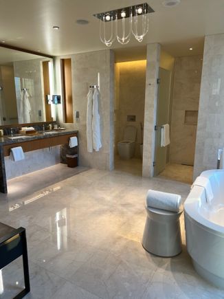 Main bathroom with rainfall and shower handle and tub