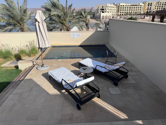 Two loungers with private pool