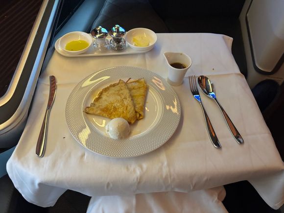 Warm crêpes Suzette vanilla ice cream