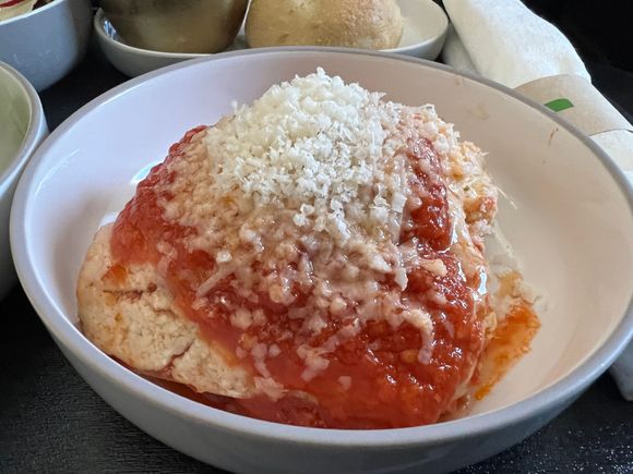 Lasagna - ricotta, fresh tomato sauce, parmigiana.  Very tasty, slightly different look from someone else’s post.
