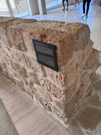 Part of the original wall runs through the lobby.