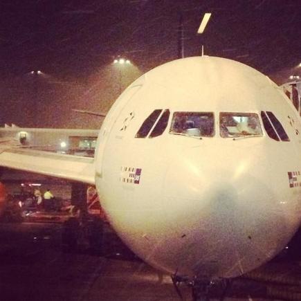 Admiring a SAS plane at Stockholm Arlanda before boarding another flight to London.