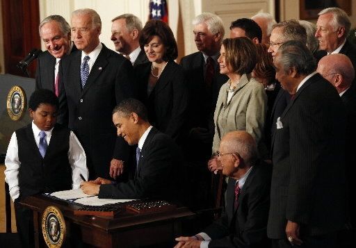 Dingell is on the right, seated