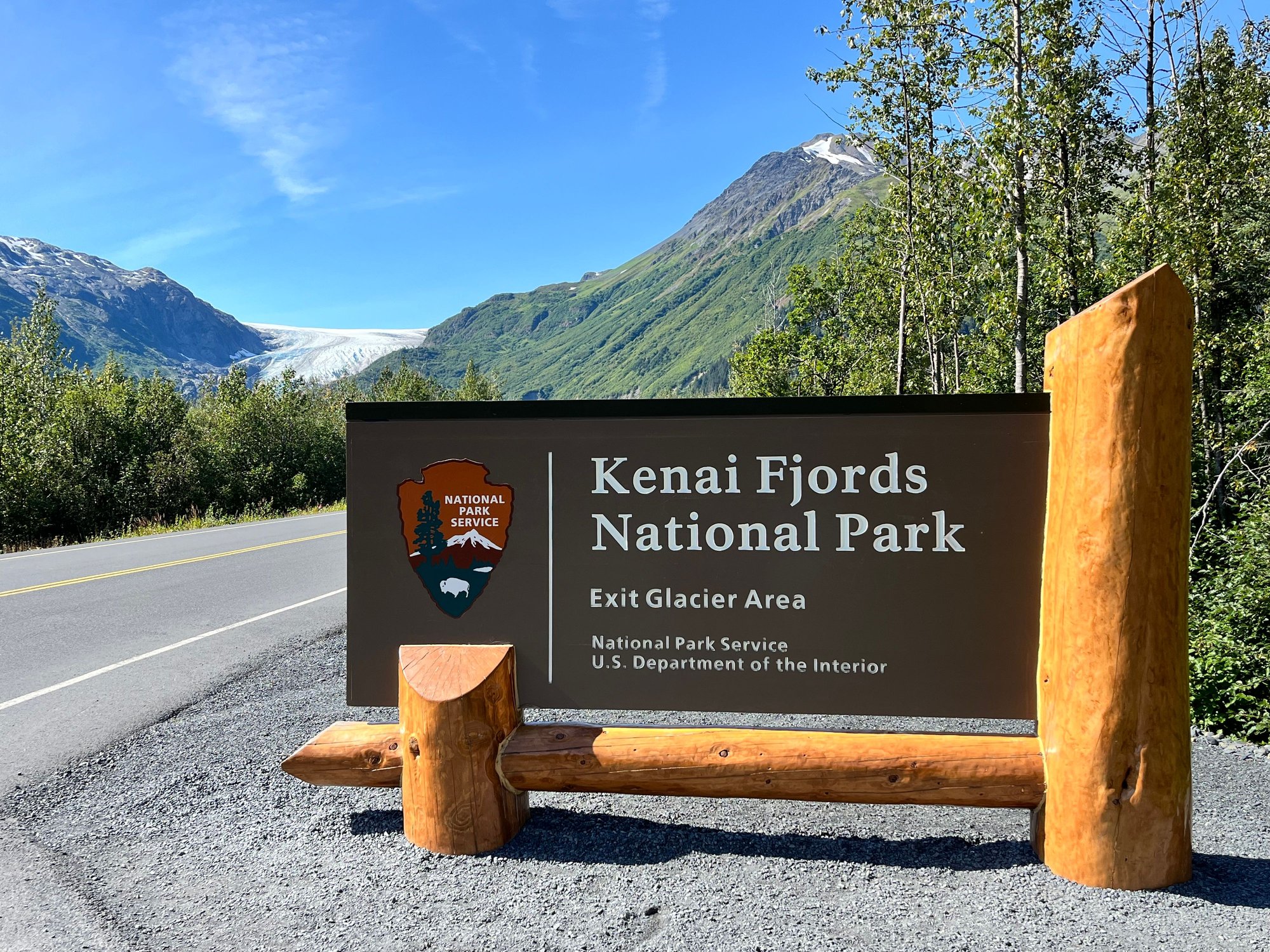 Obligatory National Park sign; exit glacier visible in the back