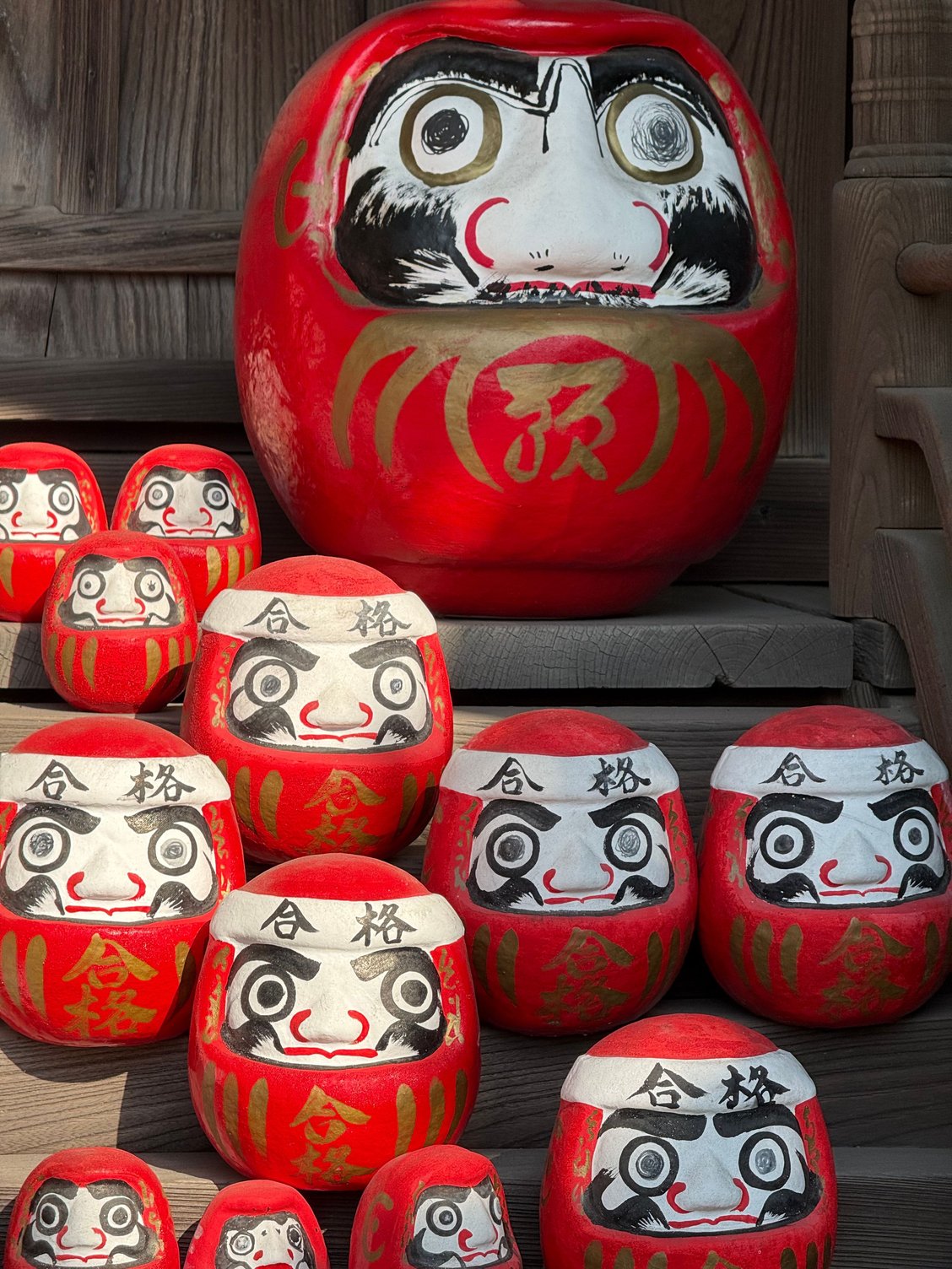 close up of daruma dolls at the Achi shrine complex