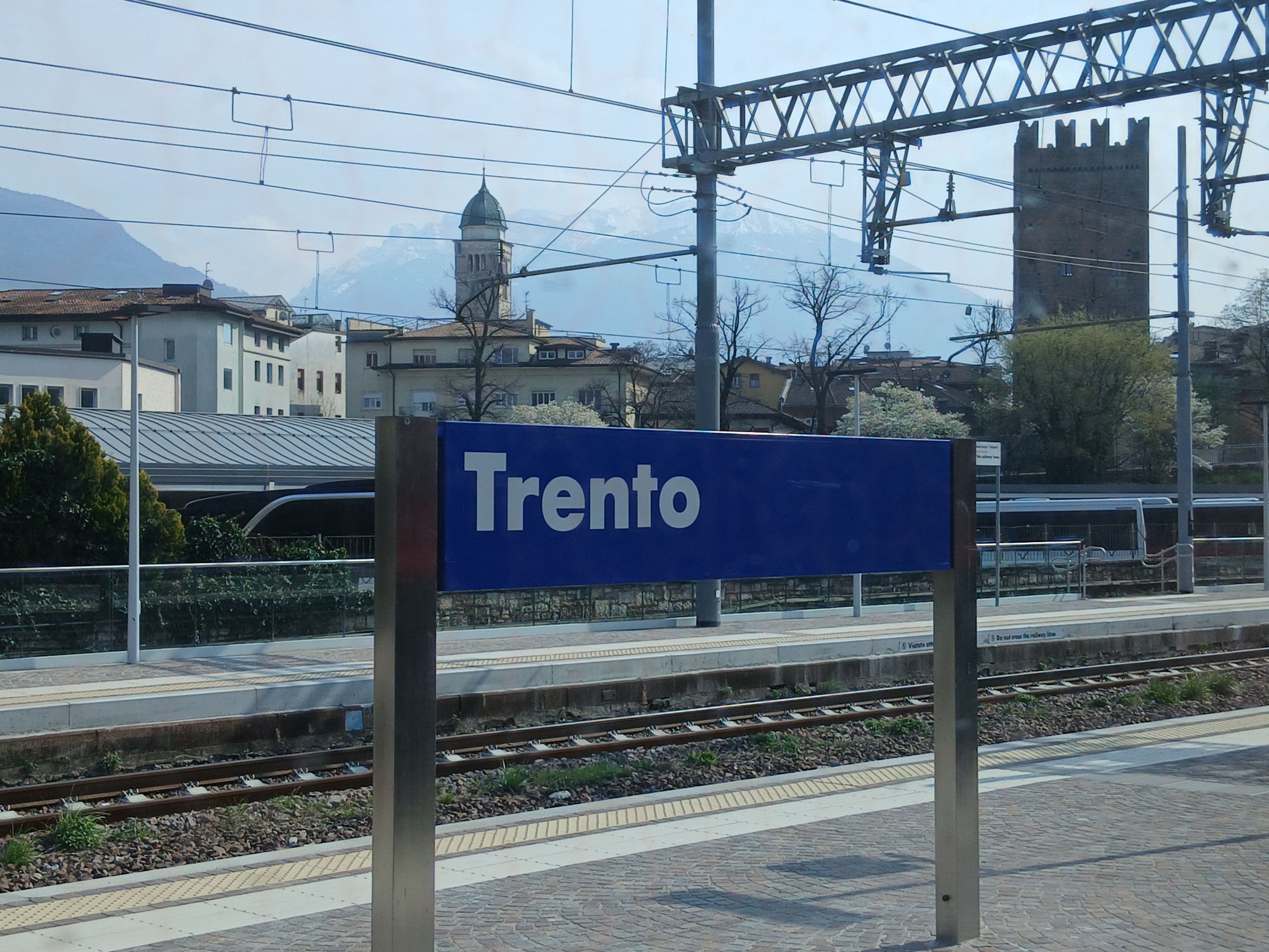 Trento/Trient train station, a glimpse of the old town