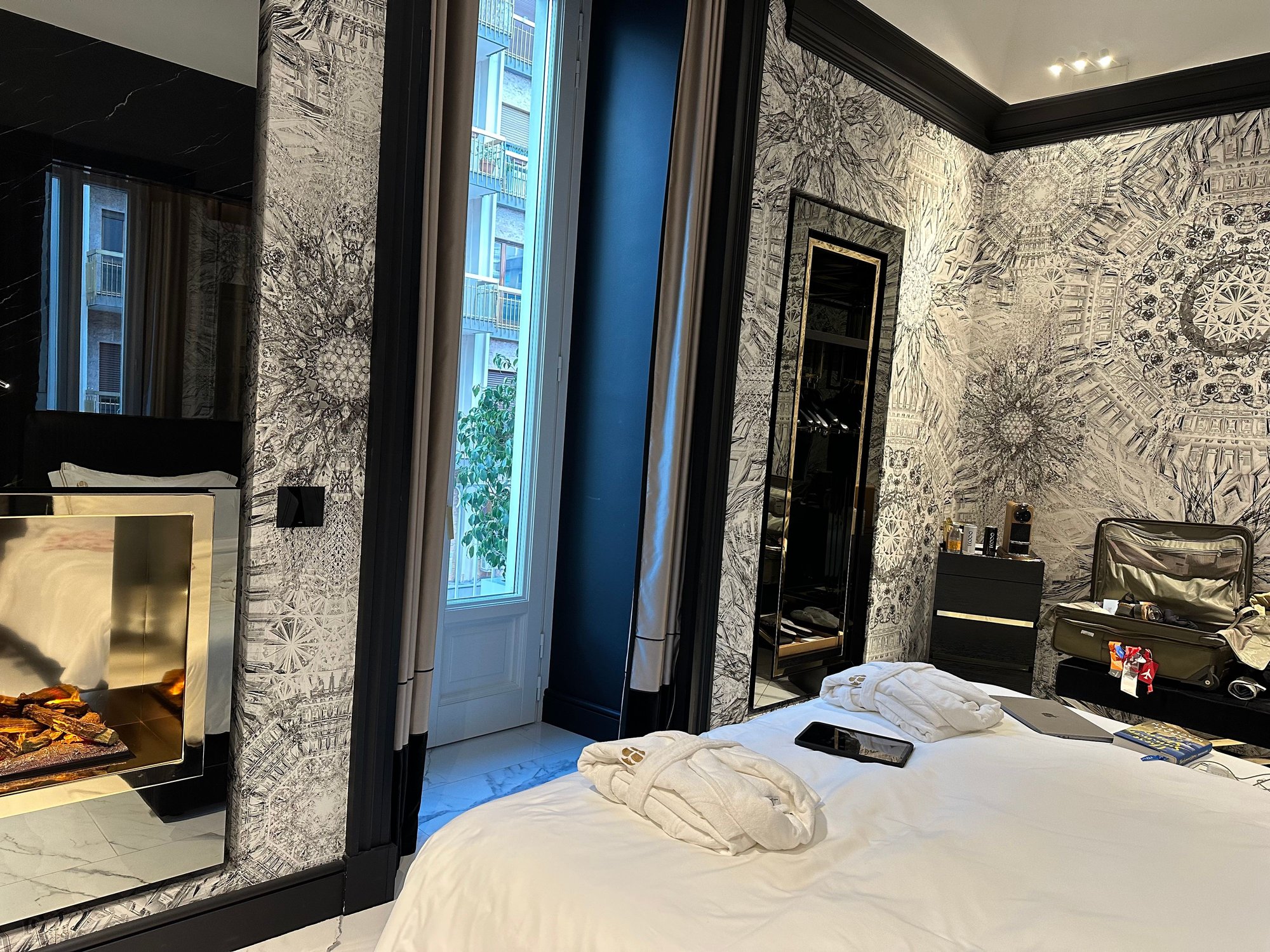 HOTEL BRA, Bari, room 203--there was some wallpaper on these walls but the floor and all other walls are marble.