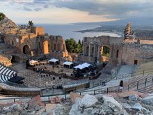 The sun breaks through for a moment just before sunset over Taormina’s 2000 year old Teatro Greco