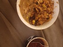 Turkey hash made with sauteed red onions and diced yukon gold. Served with homemade gravy and a quick batch of whole berry warm  cranberry sauce. I had about 1/3 of this bowl. 