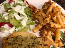 
Ziti bolognese,  salad with homemade ranch (urgently requested by all parties, lol, and garlic Parmesan bread.  I had this loaf that was the tiniest bit stale and gave it the full Monty of melted
Butter, garlic, dried herbs and grated Parmesan.  It’s a recipe from their school days they remember fondly as we had it a lot with spaghetti.