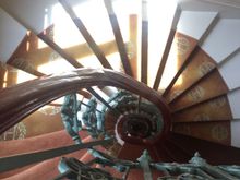 Top of the spiral staircase.  See her feet.
