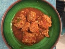These are chickpea flour and chicken dumplings in a 
thin tomato sauce with cumin and poblano peppers.

They are made from several different recipes but easy and  delicious , and gluten free. I’ll make tgem again.