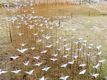 This drift of seagulls is wonderful!  Imagine making all those origami seagulls.  