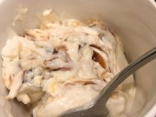 Vanilla, toasted coconut and almonds and caramel ribbon ice cream.