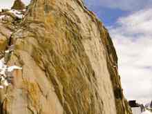 The top most point, the needle.