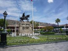 The Plaza Mayor, or Central Plaza, of Ayacucho.  The statue commemorates Antonio José de Sucre, the Venezuelan liberator who, once things had been wrapped up in Ecuador and in his own country, joined his fellow Venezuelan Simón Bolívar in the liberation of Peru, which he achieved at the Battle of Ayacucho nearby in 1824.  (Hence the “Bi[c]entenario” at the base of the statue.)
