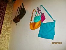 Yes, I hung handbags on the stairway wall