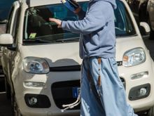 Passerby across from basilica. He is summoning Vatican police to come arrest the evil camera-toting tourist.