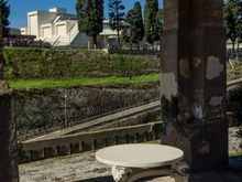 The Antiquarium of Herculaneum is framed by the room with a white marble table. A few such tables can be found throughout the site. Numerous Herculaneum relics are considered to be better-preserved than most found in Pompeii. There wooden bed frames, window frames, room dividers, two-story taverns and more.
*Next: Ravello