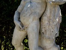 Hercules having a piss after getting stinking drunk while hunting boar.