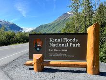 Obligatory National Park sign; exit glacier visible in the back