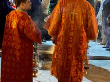 Incense bearers at the head of the procession. They stood like this for about 10 minutes while the priests were chanting. You can see the epitaph, or "coffin" between the incense bearers. 